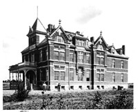 The original hospital building was completed in 1893, but due to a nationwide recession, it did not open until 1899.