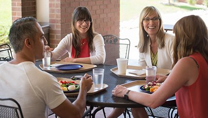 NJH employees eating outside of the cafeteria