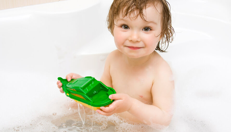 Young boy in the bath