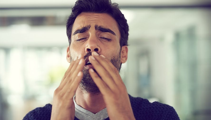 man sneezing