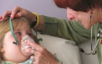 asthma girl with oxygen mask