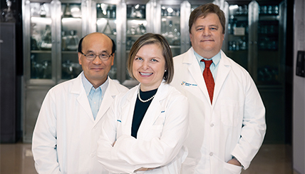 group of smiling physicians