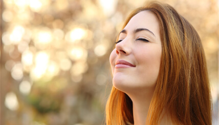 woman breathing in fall air