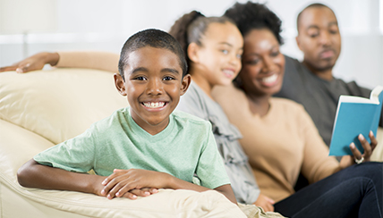 Tips and Resources to Help Children Cope with COVID-19 (Coronavirus): Family reading together