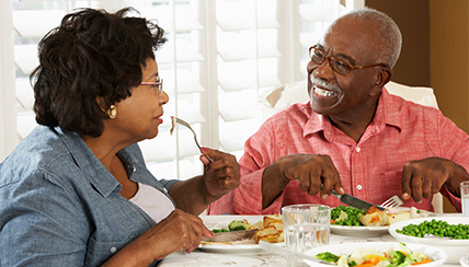 COVID-19 and Your Heart: Couple eating a healthy meal together